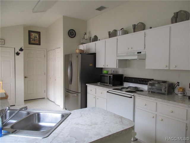 kitchen with white cabinets, appliances with stainless steel finishes, and sink