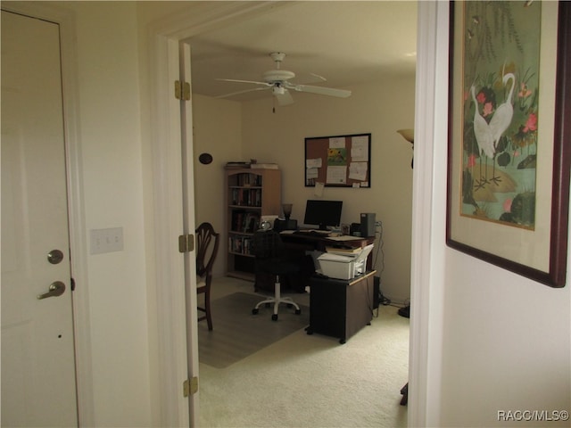 office featuring carpet and ceiling fan