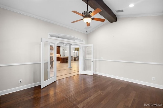 spare room featuring french doors, crown molding, hardwood / wood-style floors, and vaulted ceiling with beams