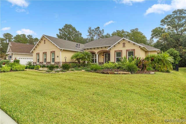 ranch-style house with a garage and a front yard