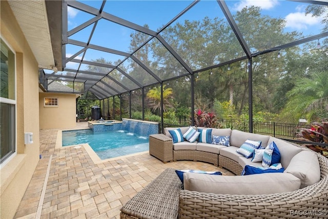 view of swimming pool featuring a patio, an outdoor hangout area, pool water feature, and glass enclosure