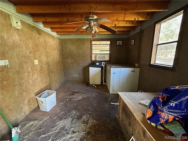 miscellaneous room with beam ceiling, washer / clothes dryer, and ceiling fan