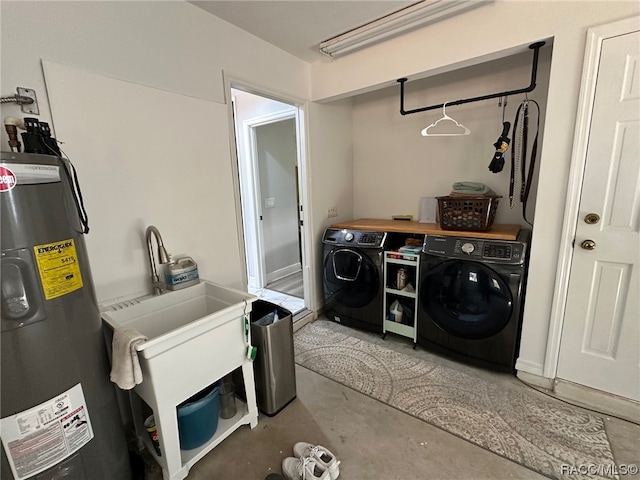 washroom featuring washer and dryer and electric water heater