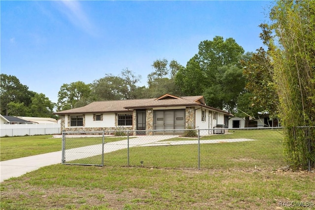 5761 S Eaton Ter, Inverness, FL 34452 - view of front facade featuring stone siding and driveway