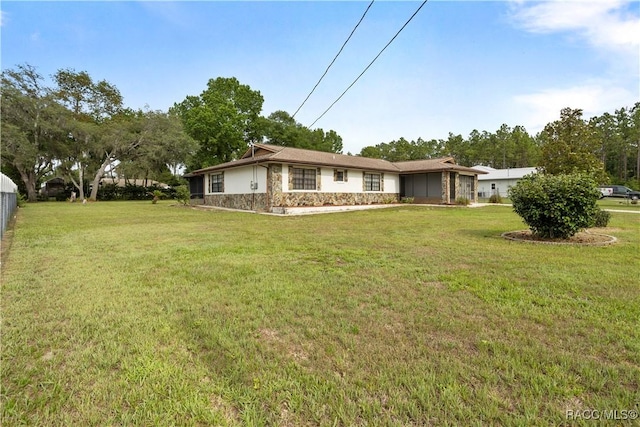 5761 S Eaton Ter, Inverness, FL 34452 - exterior space with stone siding and a lawn