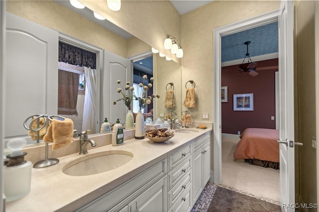 bathroom with vanity and tile patterned flooring