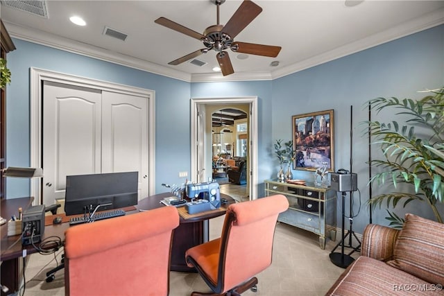 home office featuring ceiling fan and ornamental molding