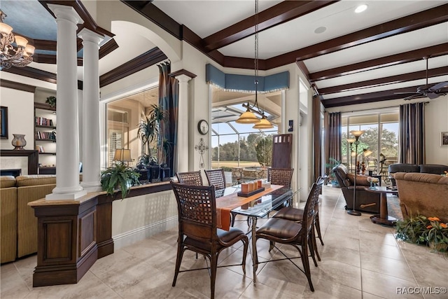 tiled dining room with beam ceiling and ornate columns