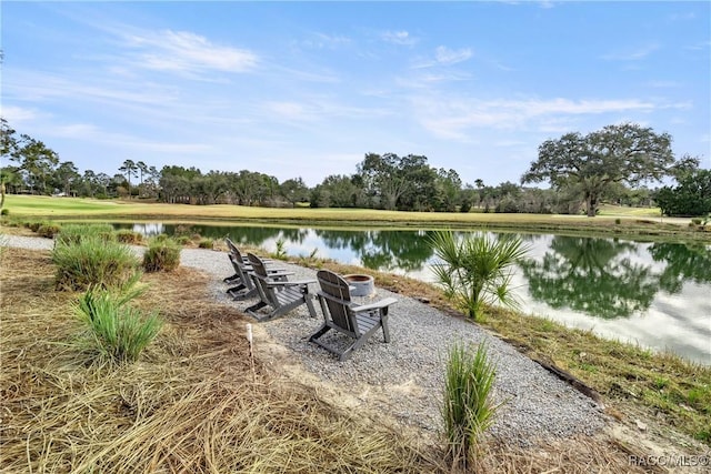 view of patio featuring a water view