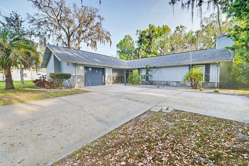 ranch-style home with a garage