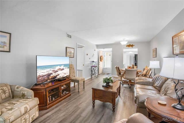 living room with hardwood / wood-style floors