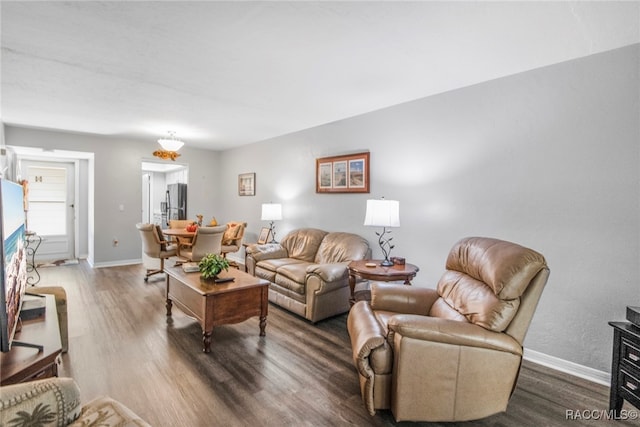 living room with dark hardwood / wood-style floors