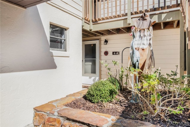 doorway to property with a balcony