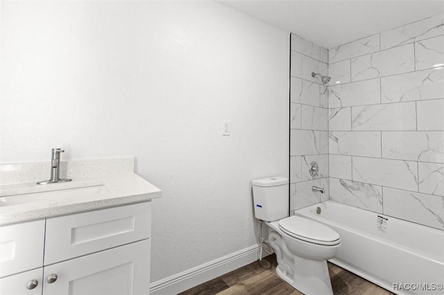 383 S Rooks Ave, Inverness, FL 34453 - full bath with vanity, toilet, baseboards, shower / bathtub combination, and wood finished floors