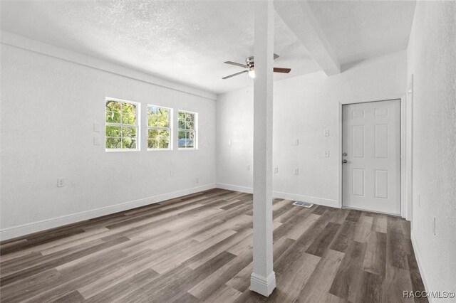 383 S Rooks Ave, Inverness, FL 34453 - spare room with a ceiling fan, wood finished floors, a textured ceiling, baseboards, and visible vents
