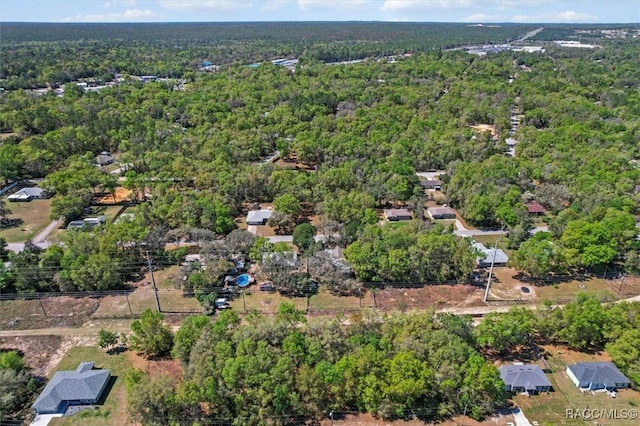 383 S Rooks Ave, Inverness, FL 34453 - birds eye view of property with a forest view