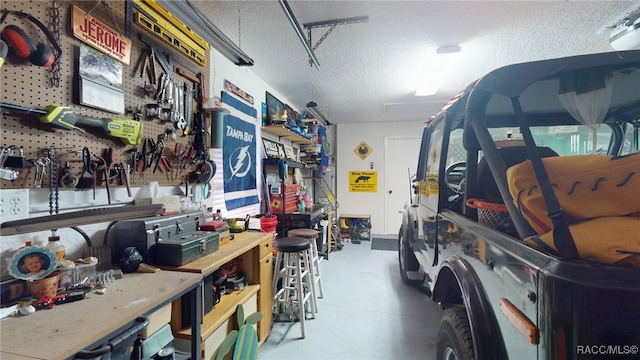 826 E Gaines Ln, Hernando, FL 34442 - garage with a workshop area and electric panel