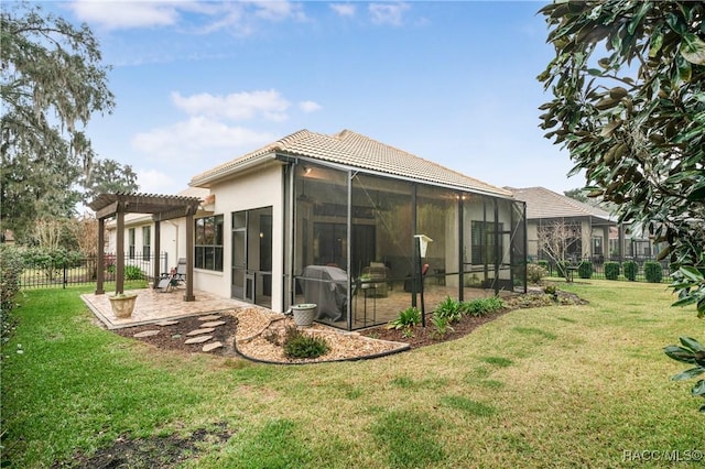 rear view of house with a patio, fence, a pergola, and a yard