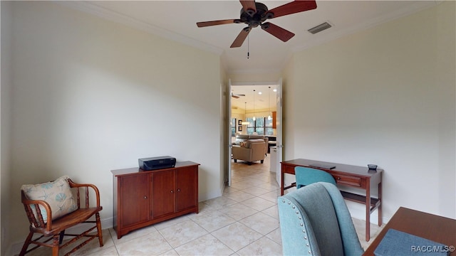 office featuring light tile patterned floors, ceiling fan, visible vents, and ornamental molding