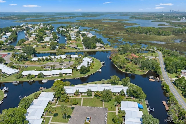 drone / aerial view with a water view