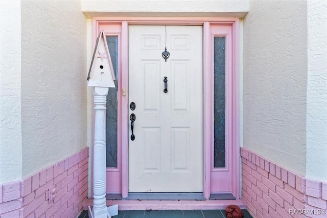 330 W Hillmoor Ln, Beverly Hills, FL 34465 - doorway to property featuring stucco siding
