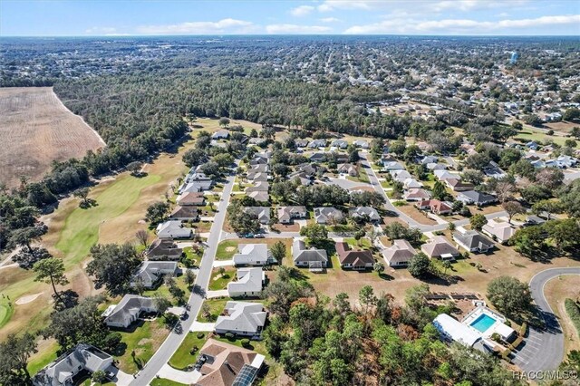 330 W Hillmoor Ln, Beverly Hills, FL 34465 - aerial view of property's location featuring a local golf course and nearby suburban area