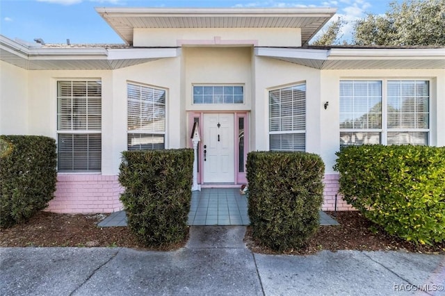 330 W Hillmoor Ln, Beverly Hills, FL 34465 - doorway to property featuring stucco siding
