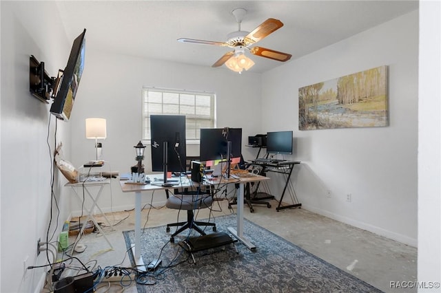 office featuring concrete flooring and ceiling fan