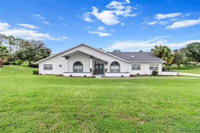 view of front of home with a front lawn