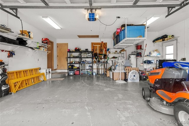 garage featuring a garage door opener