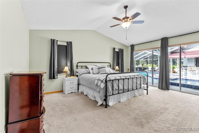 bedroom featuring access to exterior, ceiling fan, a textured ceiling, vaulted ceiling, and light carpet