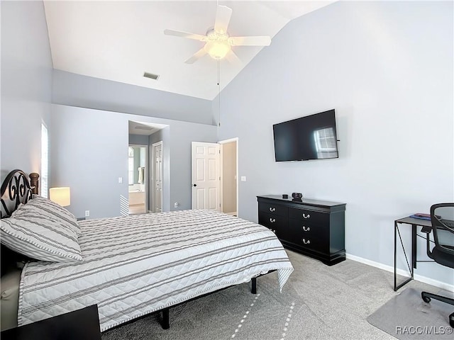 bedroom with lofted ceiling, ceiling fan, and light carpet