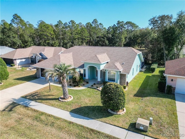 view of front of home featuring a front lawn