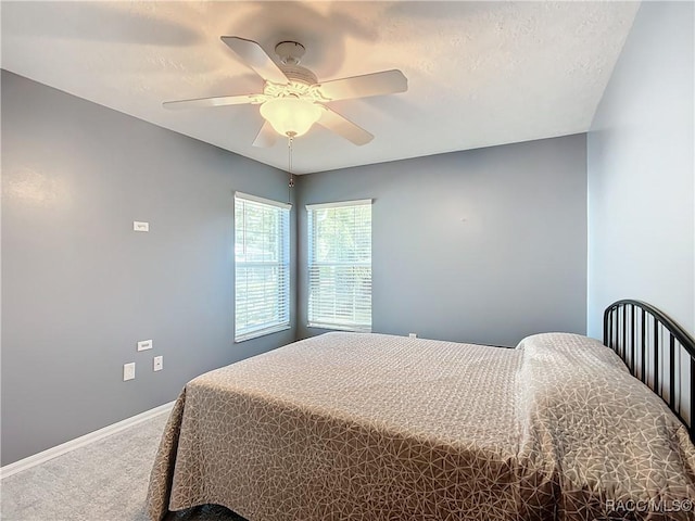 bedroom with carpet floors and ceiling fan