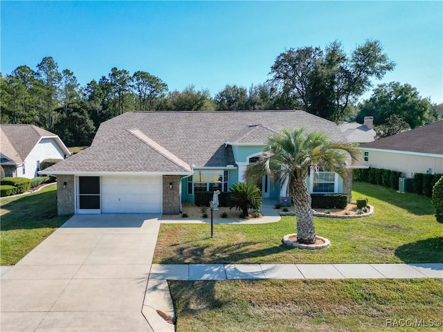 ranch-style house with a front lawn and a garage