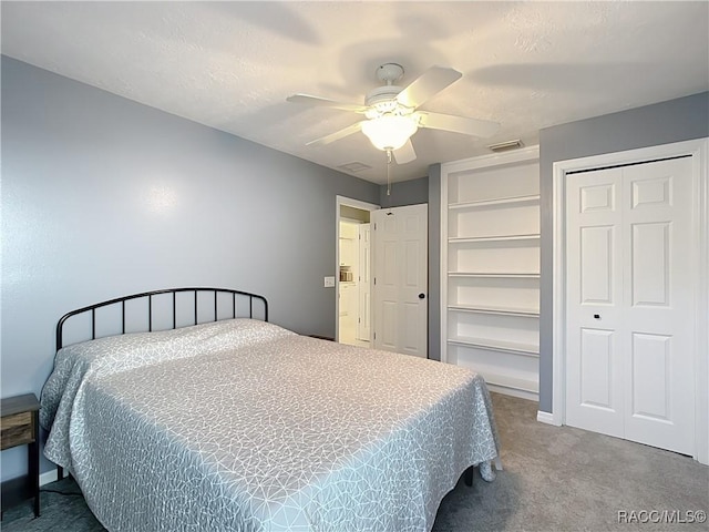 carpeted bedroom featuring ceiling fan