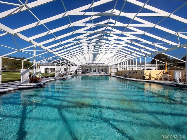 view of pool with a lanai