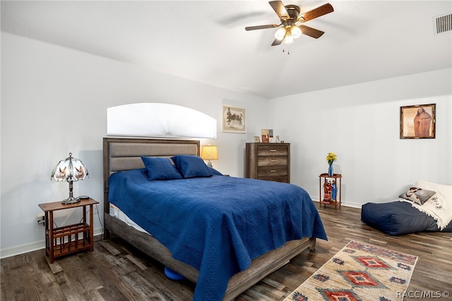 bedroom featuring dark hardwood / wood-style floors and ceiling fan