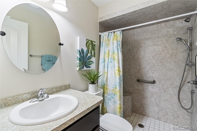 bathroom with a shower with curtain, vanity, and toilet