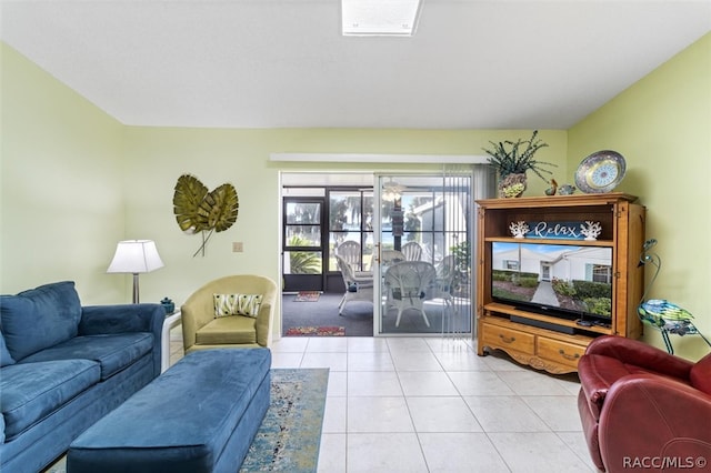 living room featuring light tile patterned flooring