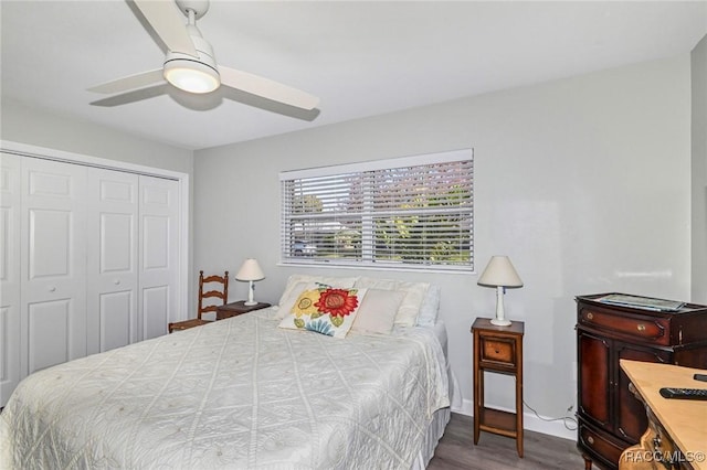 bedroom with a closet, ceiling fan, and wood finished floors