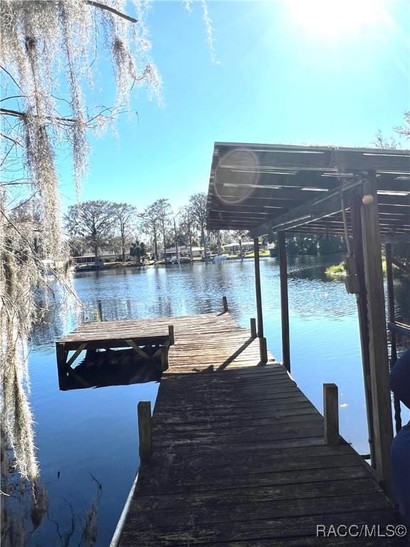 view of dock featuring a water view