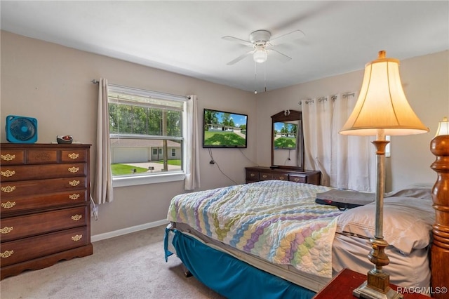 833 Maple Ave, Inverness, FL 34452 - bedroom with carpet, baseboards, and ceiling fan