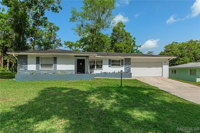 833 Maple Ave, Inverness, FL 34452 - ranch-style house featuring stone siding, a garage, driveway, and a front lawn