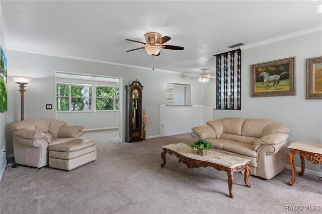 833 Maple Ave, Inverness, FL 34452 - carpeted living room featuring ornamental molding, a ceiling fan, and baseboards