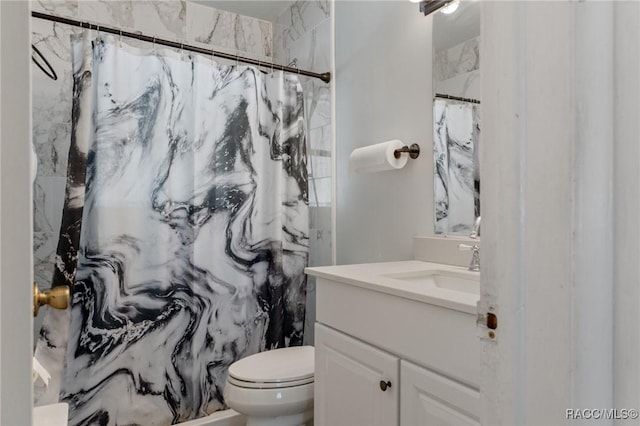 833 Maple Ave, Inverness, FL 34452 - bathroom with vanity, toilet, and a marble finish shower