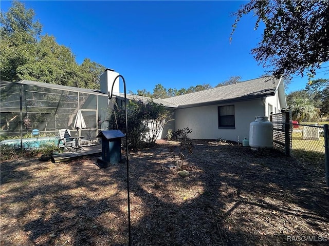 view of yard with a lanai