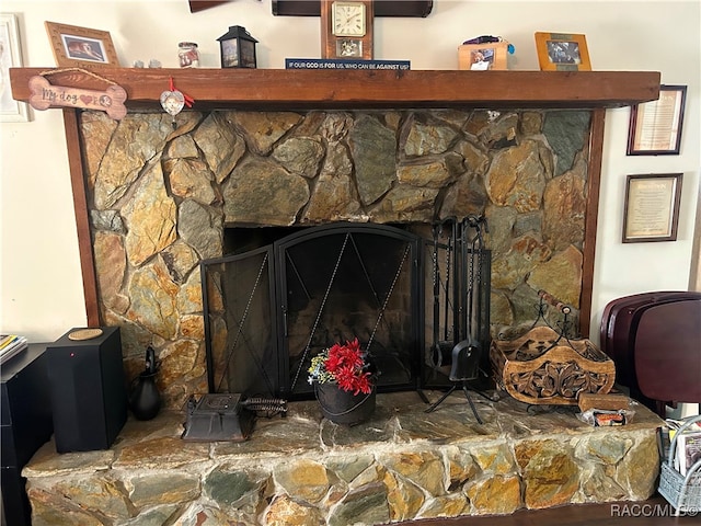 details featuring a stone fireplace