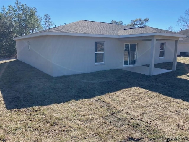 back of property featuring a patio