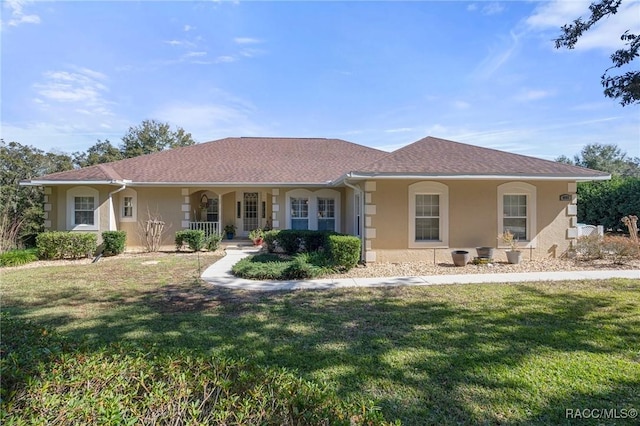 ranch-style house with a porch and a front yard